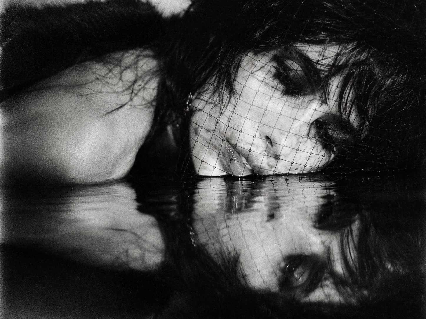 Black-and-white gothic editorial portrait for EMINATR1X audience channels